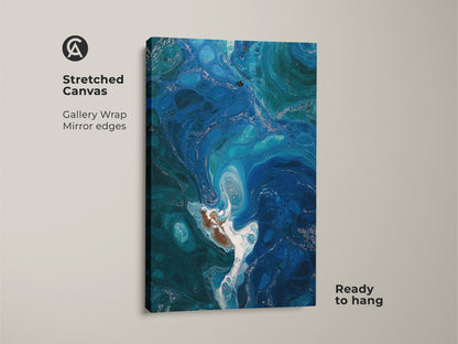 Stretched canvas print showcasing deep blue teal fluid art. The abstract ocean swirls offer a contemporary coastal aesthetic. Ready to hang with gallery wrap and mirrored edges. This is an ideal modern abstract bedroom decor or a unique fluid art gift.