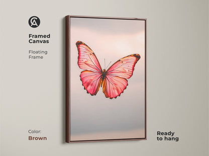 Framed canvas with a floating frame displaying insect art. The modern nature canvas is ready to hang. The minimalist butterfly decor comes in brown. The pink butterfly artwork is a rose gold butterfly print.