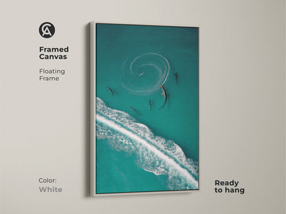 Bring the beauty of the ocean into your home with this framed artwork. An aerial shark and wave print captures the essence of coastal living. The white frame complements the turquoise and deep blue hues. Perfect for adding marine life art to any space.