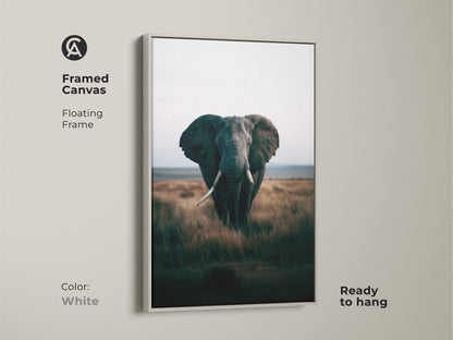 Framed canvas featuring an elephant with a floating white frame. The wildlife artwork showcases an African savanna nature scene. This ready-to-hang animal portrait enhances any decor. The natural landscape print is perfect for contemporary homes. A beautiful wall decor piece.