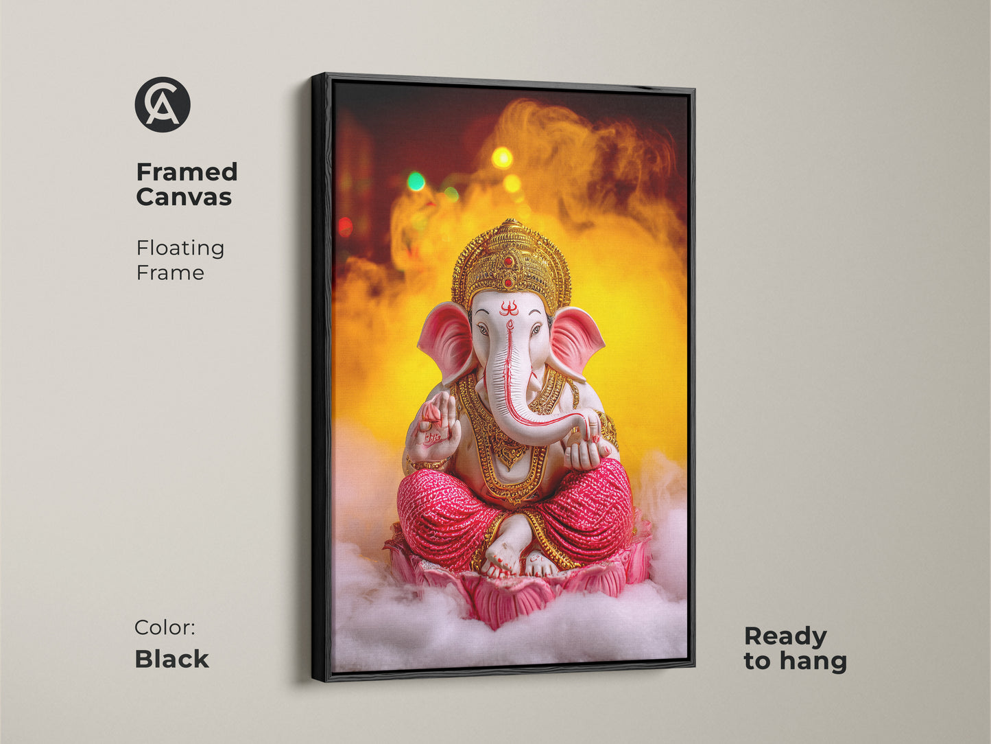 Framed canvas featuring the Pink Gold Ganesha artwork with a black floating frame. This spiritual lotus wall decor is ready to hang. It presents Hindu mythology in an elegant style. The eclectic art enriches meditation room decor. This Ganesha painting is a perfect housewarming gift.