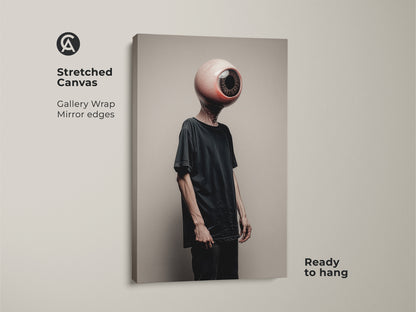 This stretched canvas features a surreal eyeball head. The dark aesthetic wall decor has conceptual figure art. It brings an eclectic touch to any room. Ready to hang with gallery wrapped mirror edges this canvas is a striking addition to modern art collections.
