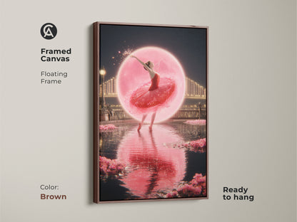 Brown framed canvas featuring a fantasy ballet dancer print. This romantic cityscape wall art is ready to hang. Pink ballerina canvas art adds dreamy bedroom decor. Contemporary dance art as a fine art canvas print. A magical ballerina poster.