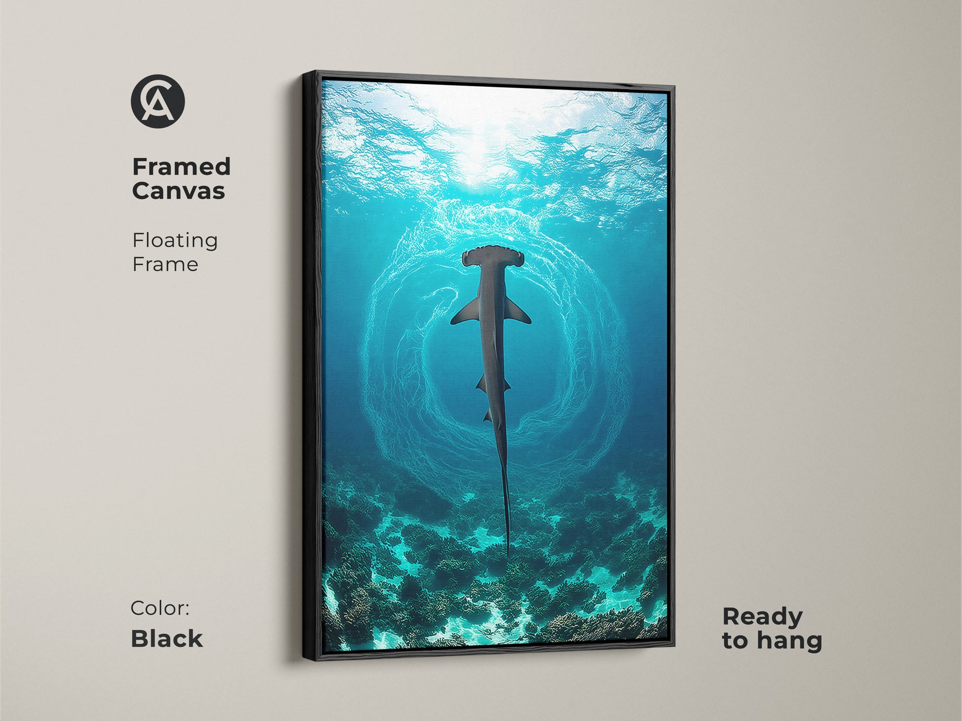 Framed canvas with a floating frame in black. This hammerhead shark wall art is ready to hang. It has a deep blue teal color palette. Perfect for coastal home decor art and marine wildlife artwork.