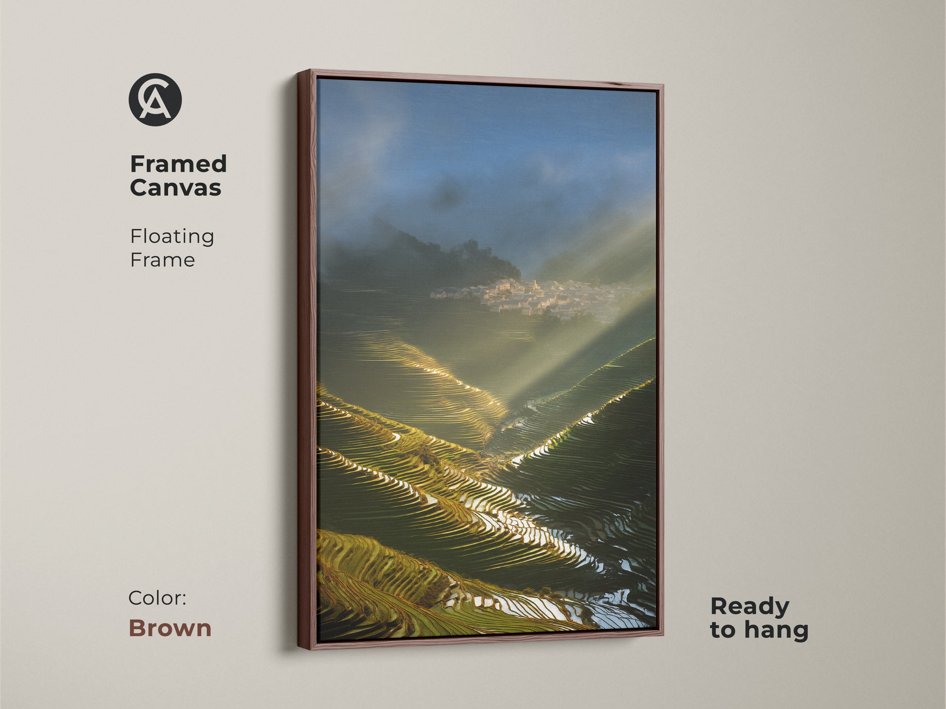 Framed Canvas displays Terrace Fields art with golden sunbeams illuminating a village. This photorealistic artwork with a brown floating frame suits modern farmhouse style. Ready to hang for travel lovers.