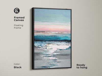 Framed canvas with black floating frame showcasing abstract seascape art. This ready-to-hang teal blue and pink artwork enhances bedroom decor. The contemporary coastal landscape print adds a modern touch. Perfect for adding calming abstract art to any space.