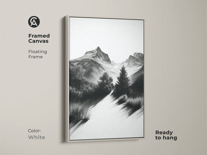 Framed monochrome mountain sketch art with a white floating frame. This black and white landscape print provides simple nature wall decor. A perfect gift for the adventure seeker.