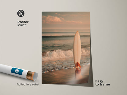 Poster print of a surfboard on a sandy shore. The artwork is easy to frame. It arrives rolled in a tube. This museum-quality paper enhances the coastal scene. This poster print adds a calming beach vibe to your decor.