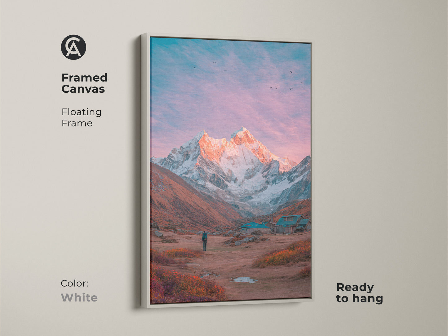 White framed canvas art of a mountain landscape. A stunning snow-capped mountain dominates the scene. The floating frame offers a clean modern look. Ready to hang. Bring the tranquility of the mountains into your home with this mountain artwork.