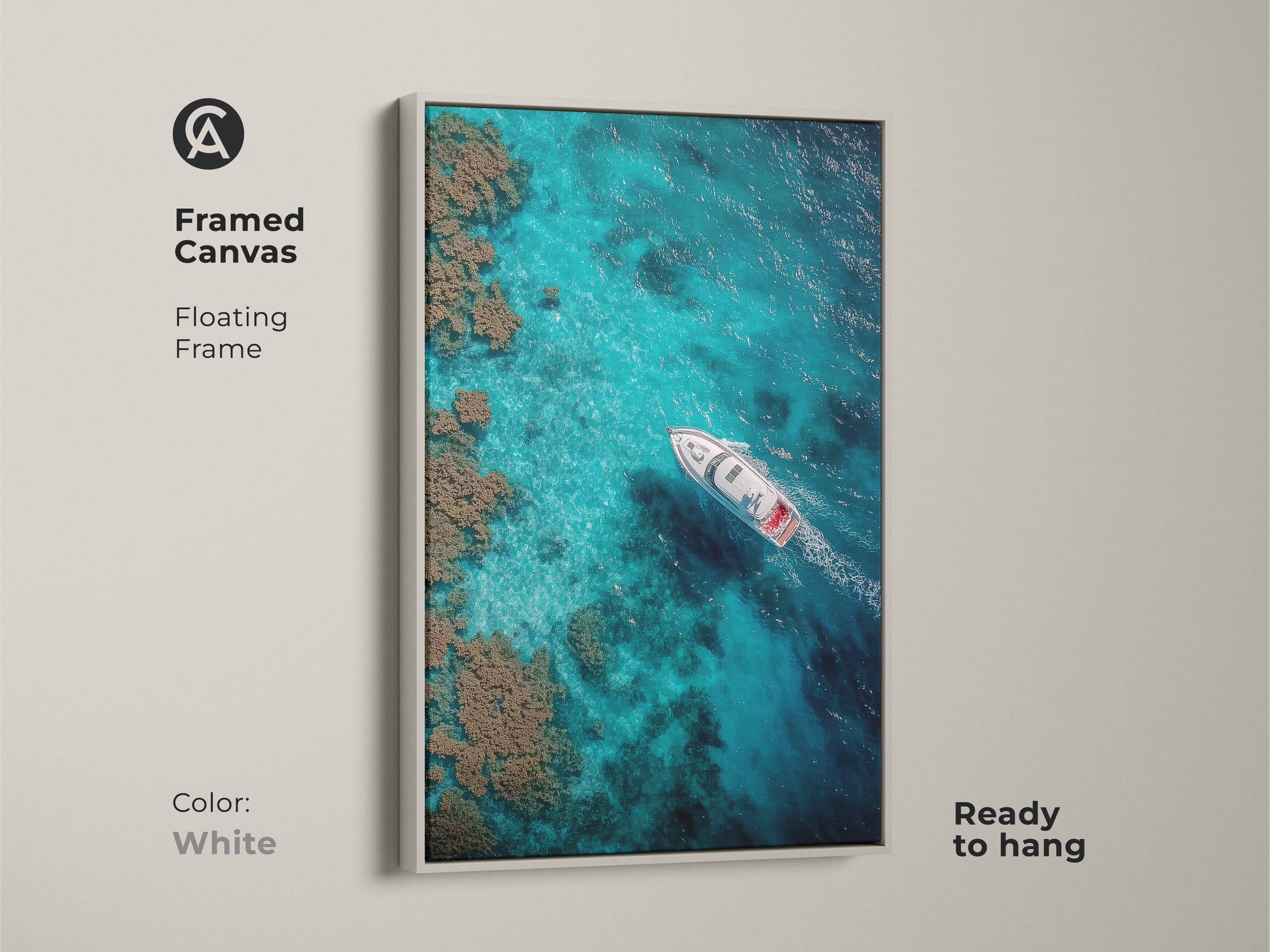 White framed canvas art. The artwork features a boat sailing on clear turquoise waters. This floating frame art piece is ready to hang. The ocean view brings a serene vibe.