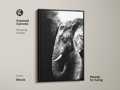 Black framed canvas of a monochrome elephant creates striking wall art. The floating frame enhances this wildlife animal canvas. Ready to hang the black and white elephant print offers modern home decor. This fine art elephant artwork suits any room.