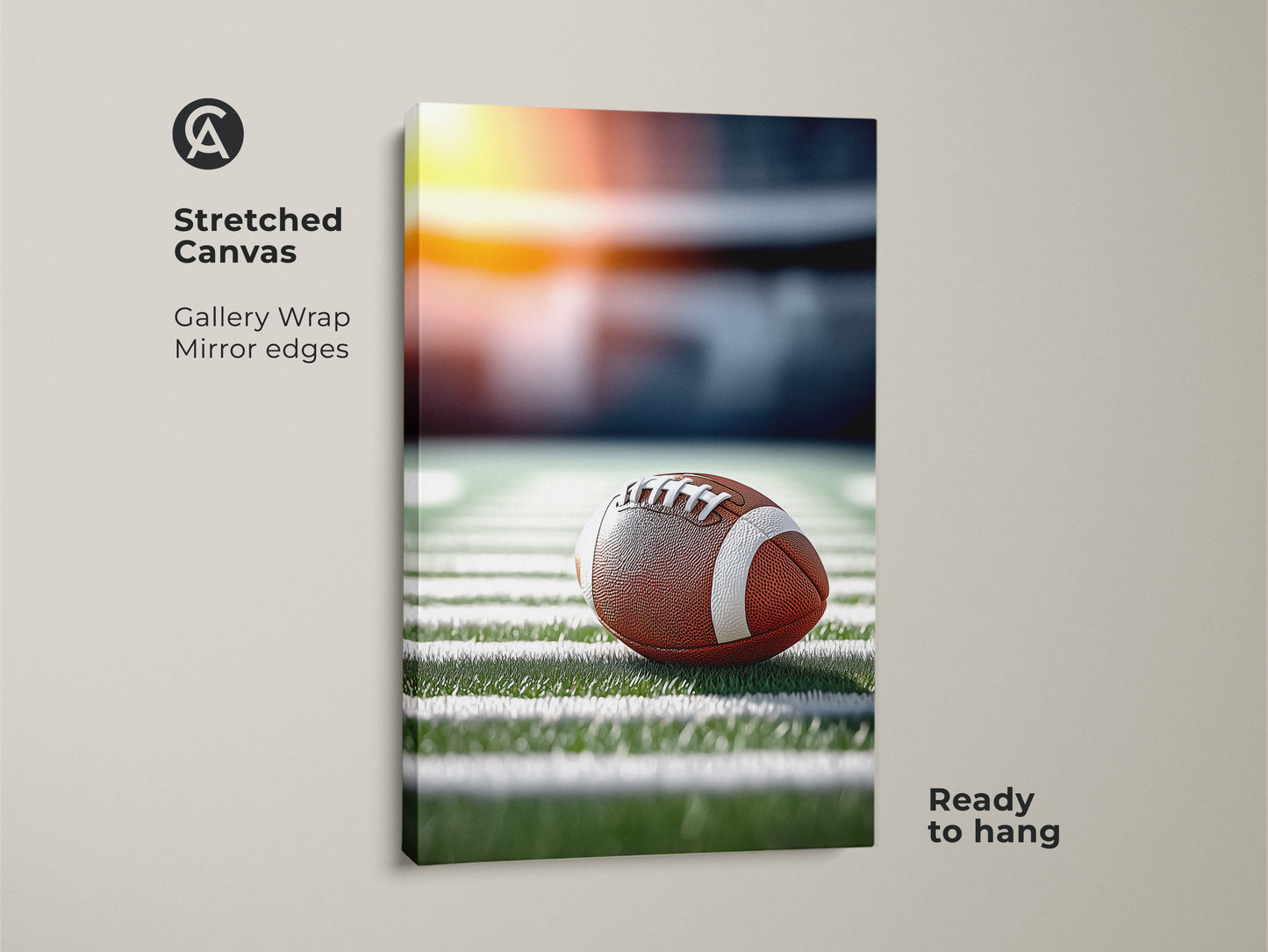 A stretched canvas featuring a realistic football on a stadium field. This gallery-wrapped art has mirror edges. It arrives ready to hang. Perfect sports fan wall decor for a man cave. It captures the essence of game day.