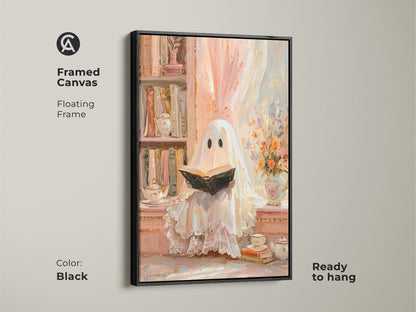 Framed canvas of a ghost reading wall art with a black floating frame. This pastel ghost art print is ready to hang. It enhances cozy study room decor in an eclectic style. A heartwarming Halloween gift for her. The bookshelf artwork in cream peach adds a soft vintage touch for book lovers.