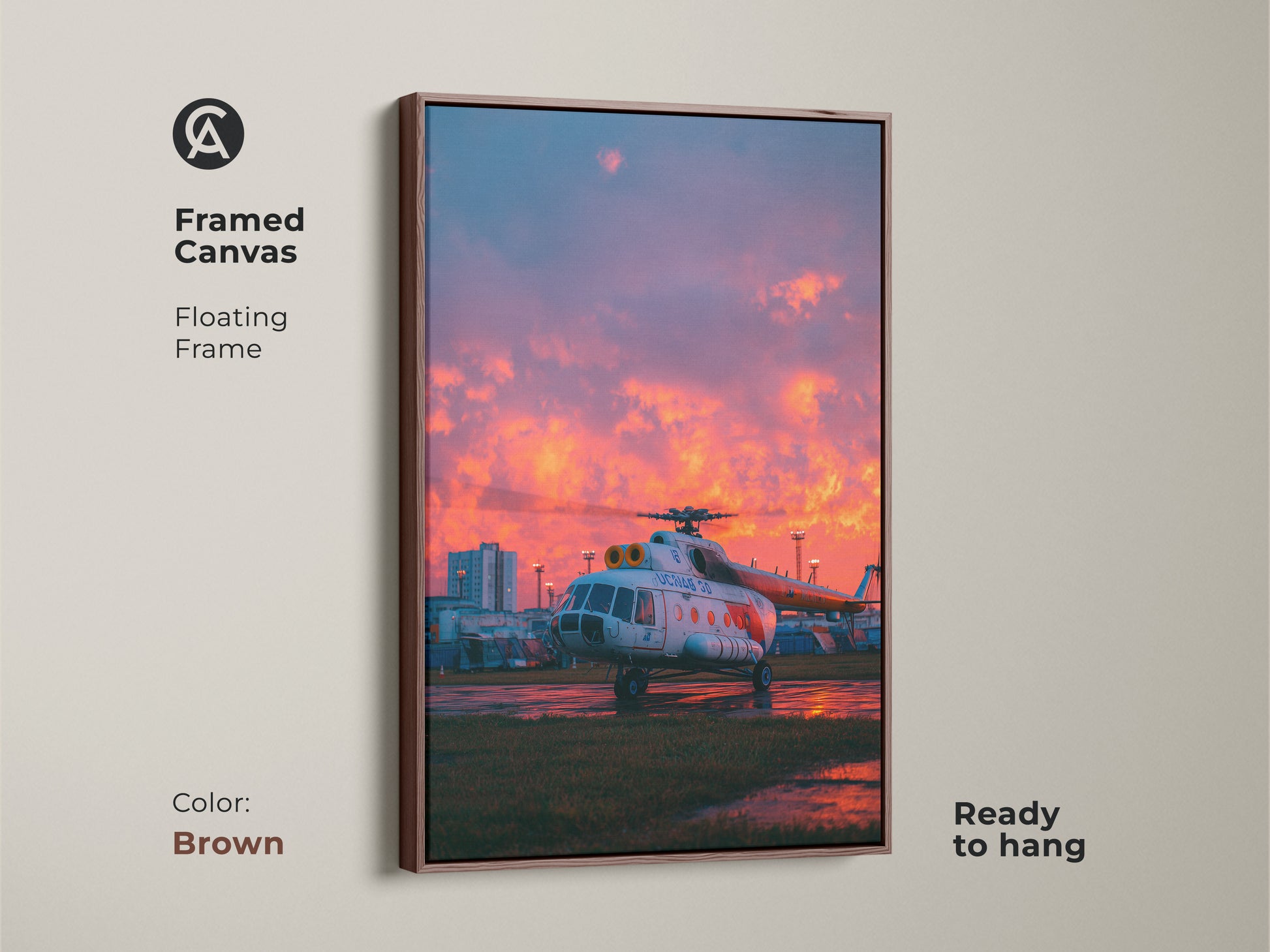 Aviation art on framed canvas with a brown floating frame. The detailed helicopter artwork brings aviation into your space. This ready-to-hang art piece offers a touch of rustic charm. Notice the sunset background.