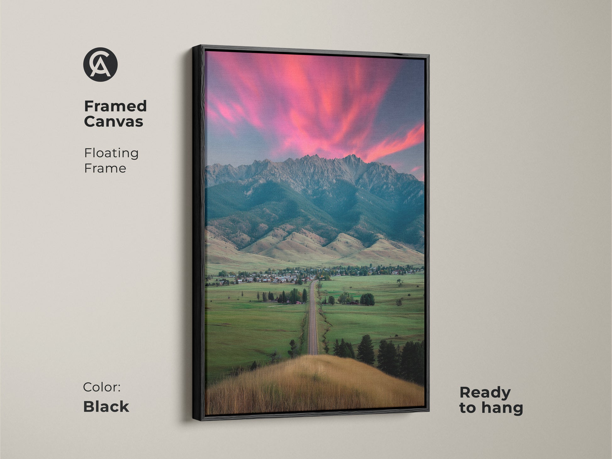 Black framed canvas features a pink sunset mountain landscape. This ready-to-hang floating frame art enhances any space. Complements modern farmhouse decor. A housewarming gift for outdoor lovers. Scenic bedroom wall art adds charm to residential decor.