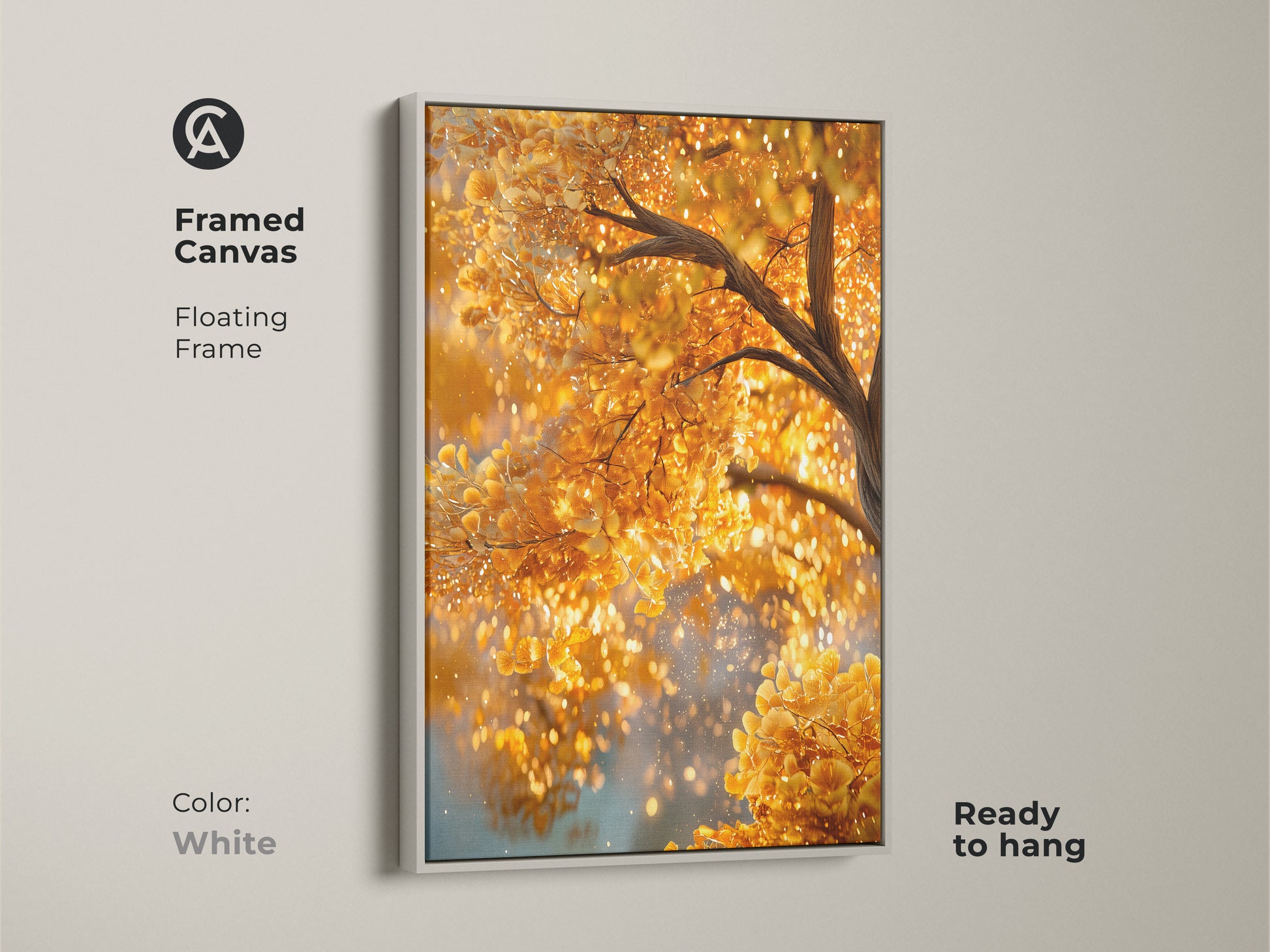 Framed canvas art of a golden tree with a white floating frame. The bright white frame makes the golden leaves pop. The artwork brings a fresh and modern feel to your decor. Ready to hang and enjoy immediately.