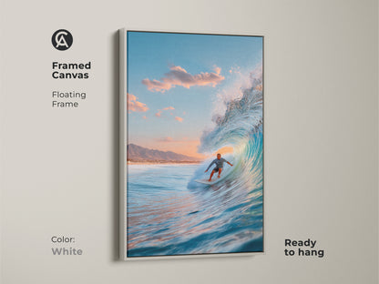 Framed canvas surfer art ready to hang. A surfer rides a blue ocean wave. Floating frame with a white finish. A great piece for coastal home decor. It adds a clean touch to any room.