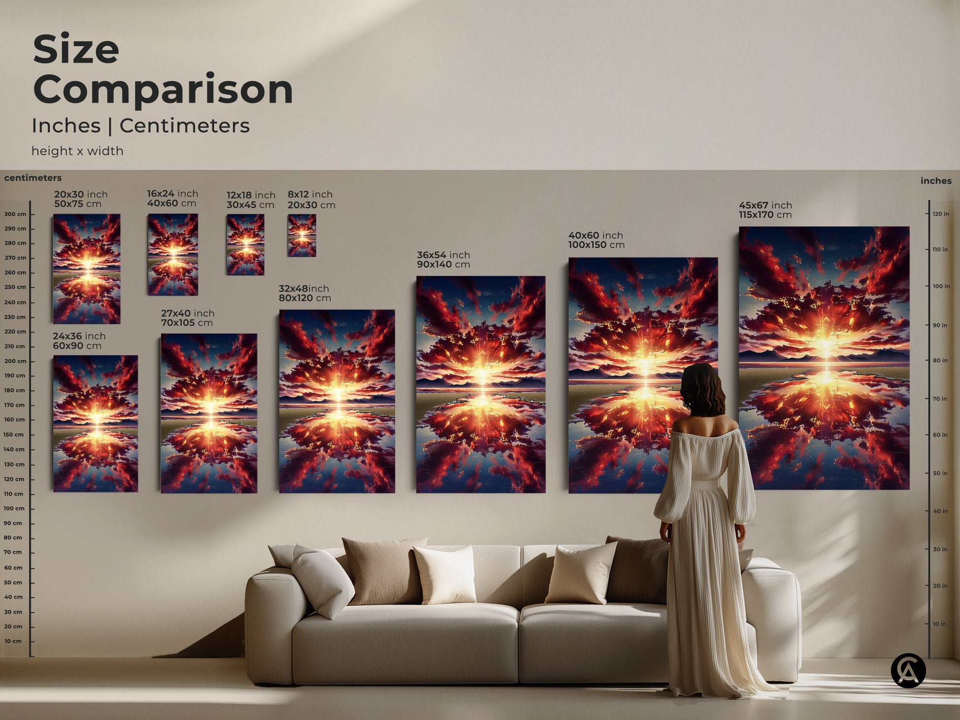 A size comparison shows various dimensions of the sunset over mountains artwork. Sizes range from small to large. It is displayed above a couch to show scale and sizing.