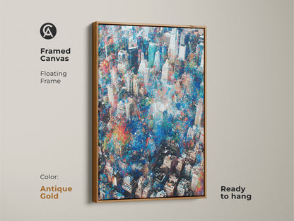 Framed aerial cityscape artwork on canvas. The floating frame is antique gold. This artwork adds a touch of elegance. The artwork is ready to hang. The antique gold frame enhances the colors of the city scene. A perfect piece for any home.