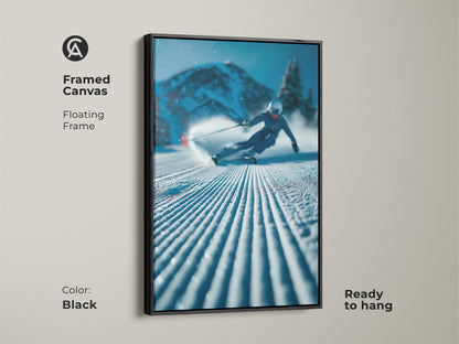 Framed canvas art featuring a skier. The floating frame adds a touch of elegance to the dynamic scene. Ready-to-hang this artwork brings the spirit of the mountains into your home. The black frame complements the winter landscape beautifully.