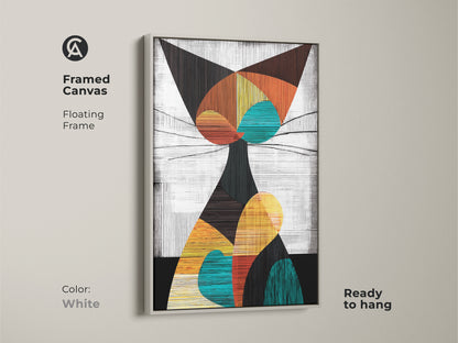 White framed canvas of a geometric abstract cat. This floating frame mid century modern artwork is ready to hang. The teal orange and yellow colors create a vibrant piece.