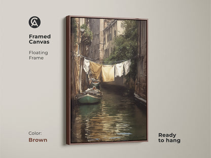 Framed canvas art displays a Venetian canal with laundry overhead and a boat. A brown floating frame complements this impressionistic cityscape wall art. Ready to hang this traditional European decor adds warmth to any space. Perfect boat in canal art.