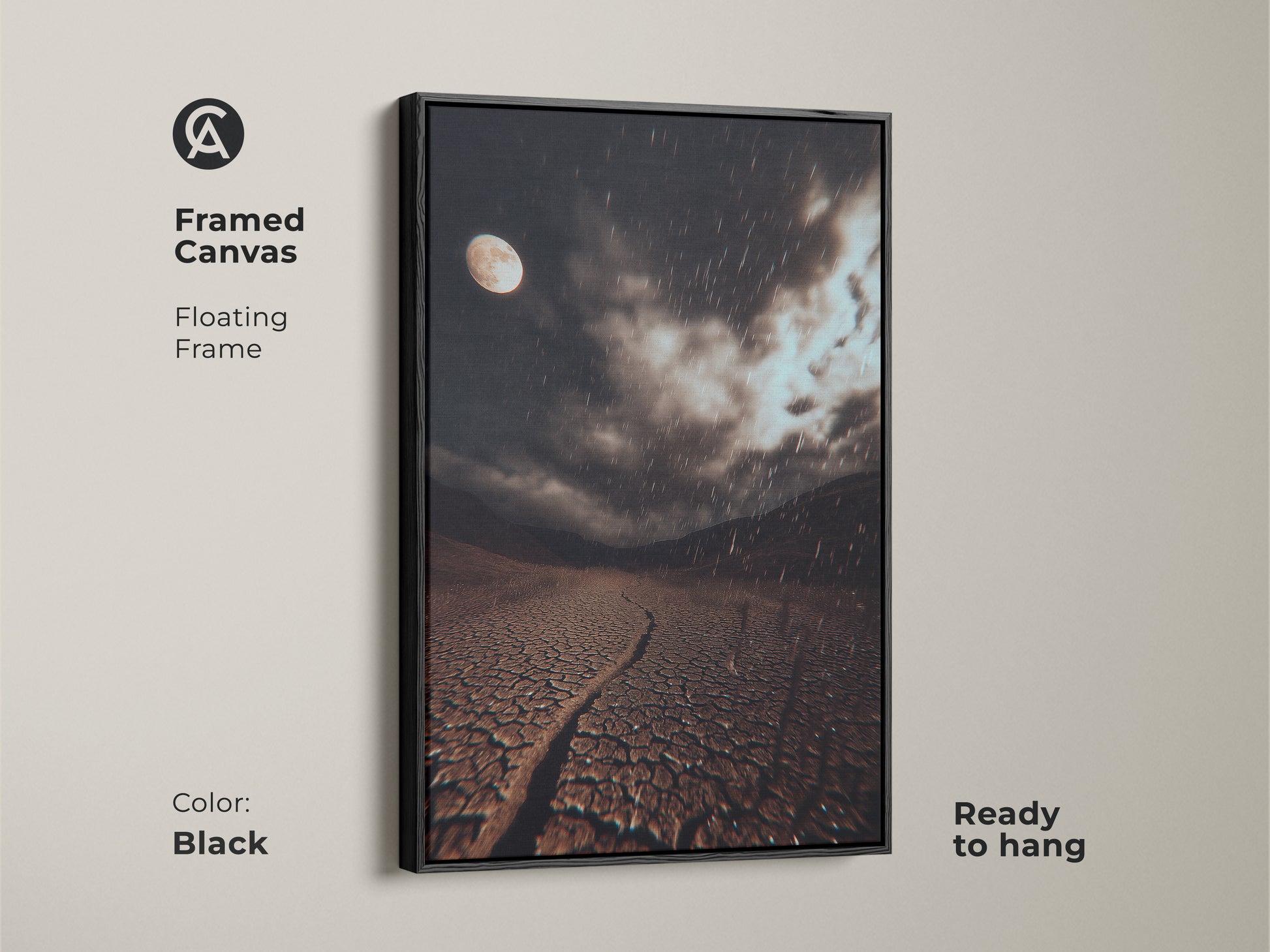 Black framed canvas art of a surreal moonlit desert landscape. This dark brown cracked earth art features a grey rainy night sky. Ready to hang in an eclectic bedroom.