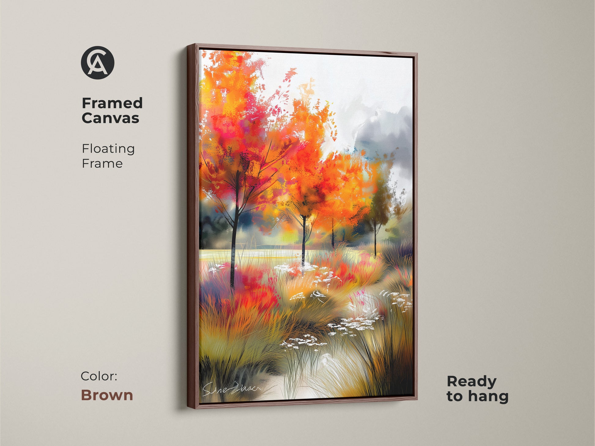 Brown framed canvas artwork featuring a vibrant autumn landscape. The floating frame complements this colorful art. Ready to hang this gallery artwork features orange trees and a tranquil stream. Shop now.