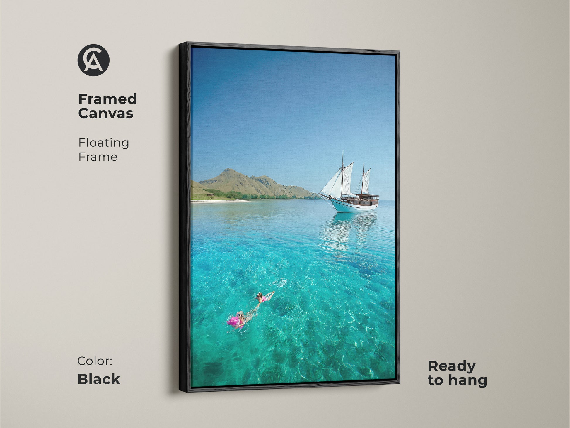 Framed canvas in black features a floating sailboat art print. The coastal artwork shows a snorkeler in clear water. Ready to hang it enhances any beach-themed decor and makes a perfect housewarming gift.