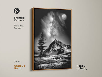An antique gold framed canvas presents monochrome mountain art. This floating frame highlights a black and white landscape with a moonlit pine tree. Contemporary nature artwork ready to hang.
