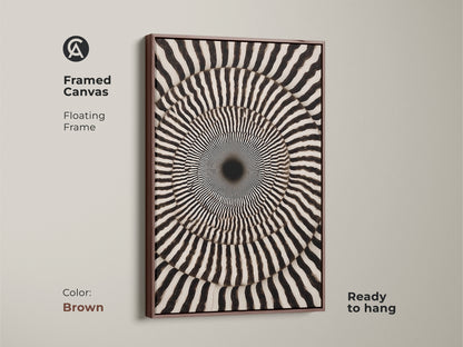 Framed Canvas showcasing Abstract Geometric Wall Art. Its Op Art Concentric Circles form a Psychedelic Swirl. The monochrome den decor is ready to hang. The brown floating frame enhances the contemporary wall hanging.