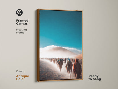 Framed canvas with a floating frame displays an abstract desert landscape. Antique gold frame provides a touch of elegance. Teal and orange tones create a striking visual. Ready to hang for easy setup. Contemporary home decor enhances the living room. A unique wall hanging art piece.