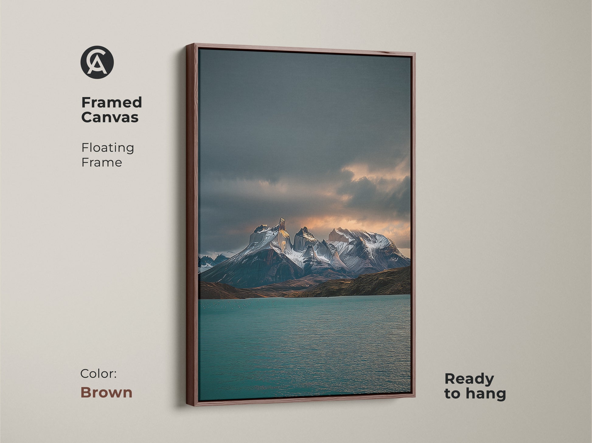 Brown framed canvas print of a teal lake and snowy peaks landscape. This contemporary blue gray nature artwork is ready to hang. A scenic lake view art for your living space.