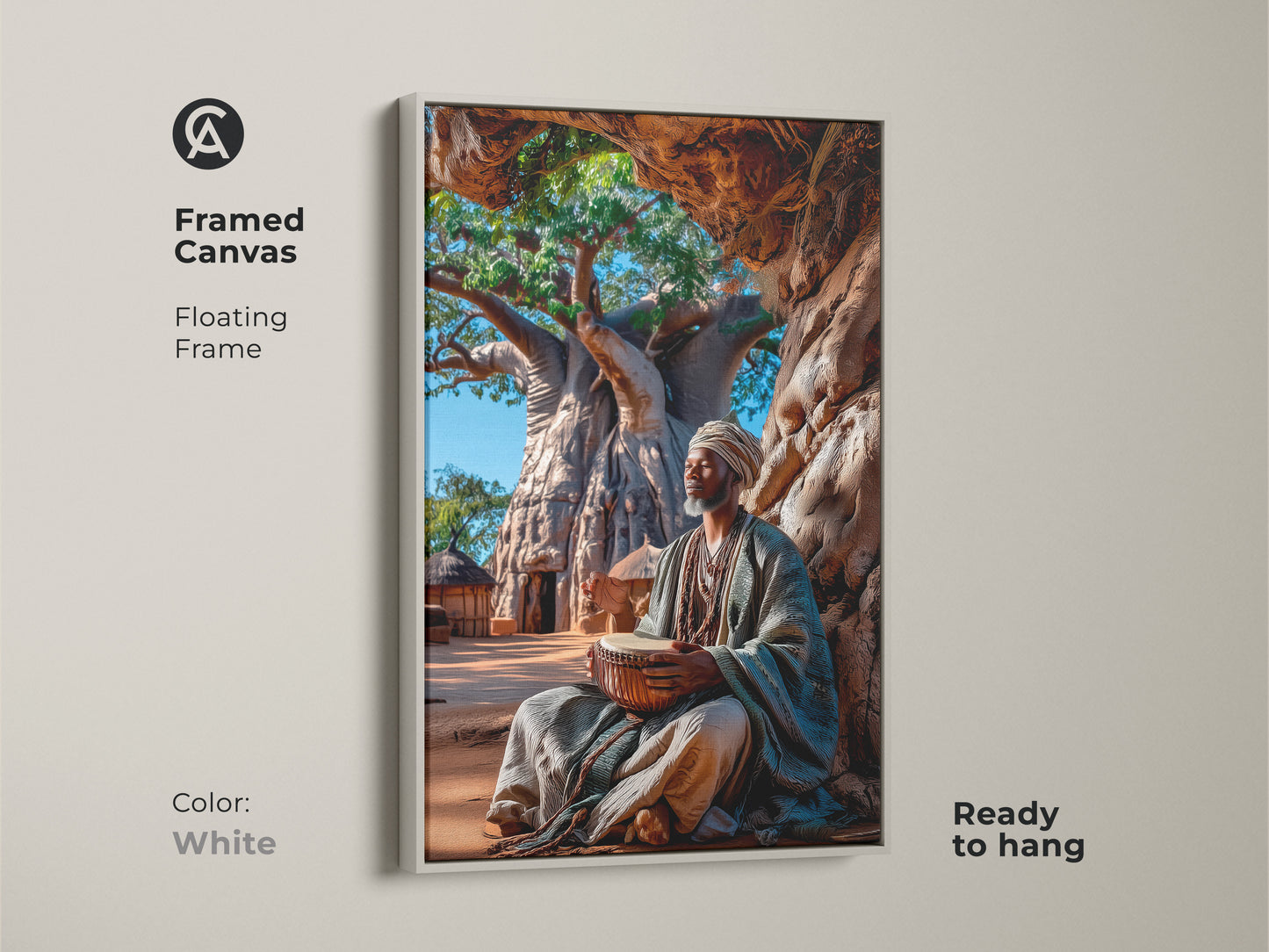 White framed canvas art of an African man drumming under a baobab tree with a floating frame. Ready to hang this cultural artwork combines boho style with earth tones. The savanna landscape art adds a rustic touch to your entryway wall decor.