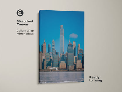 NYC cityscape canvas print showcasing a modern blue gray wall art. This contemporary office decor is a stretched canvas with mirrored edges. Ready to hang architectural skyline art. Ideal urban city art print for modern homes.