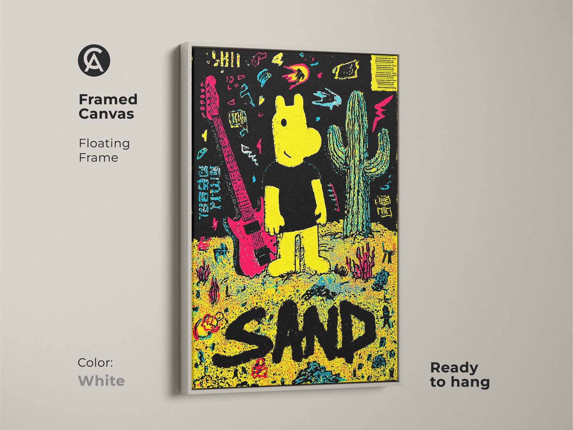 Framed canvas art print showcasing a yellow cartoon figure guitar and cactus against a black backdrop. The artwork spells out the word SAND in large black letters. This white floating frame canvas is ready to hang.