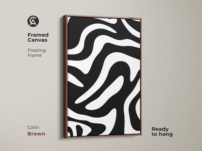Framed canvas featuring an abstract zebra waves pattern with a brown floating frame. The black and white art adds a modern touch. This contemporary wall art is ready to hang.