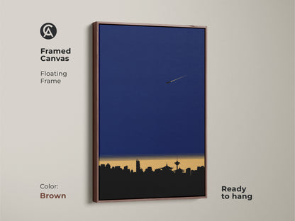 Framed Canvas showcasing minimalist cityscape artwork. This modern skyline art print comes with a floating frame. Displayed is deep blue wall art for an office. Geometric airplane wall decor that's ready to hang in brown.