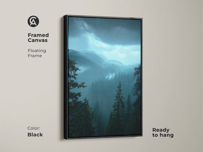 Deep blue landscape print of a mountain forest in a black floating frame. This framed canvas is ready to hang. This rustic home decor art is an outdoor lover gift idea. Nature scene wall hanging for hiker's paradise. Teal forest artwork for bedroom wall decor.