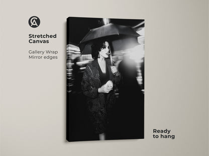 Elevate your space with this monochrome woman canvas art. The stretched canvas features a gallery wrap with mirror edges. It arrives ready to hang. This street photography print showcases a woman with an umbrella. It is ideal for fashion wall decor. Add urban chic to any room.