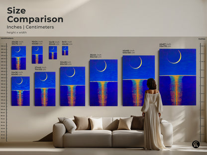 A woman views a large canvas print of abstract moon art. The celestial wall art and deep blue ochre canvas create a boho bedroom decor. This unique home wall art serves as an artistic home decor gift.