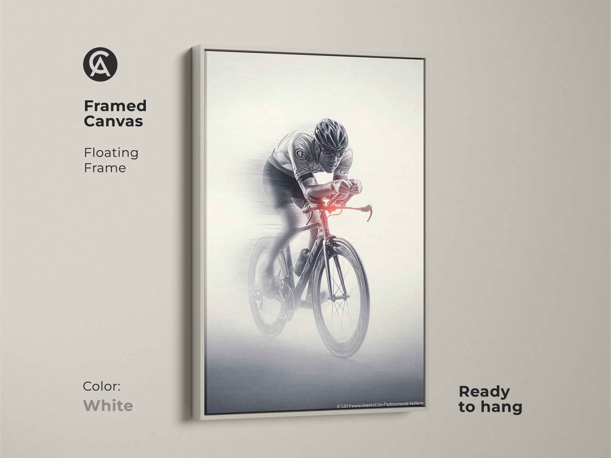 Framed canvas of a cyclist artwork. This floating frame is in white. The monochrome racing art is ready to hang. This sports speed wall art is a dynamic piece. This artwork is a great gift for a cyclist.