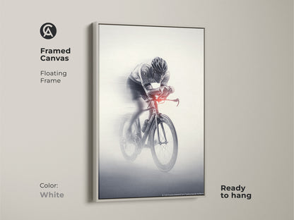 Framed canvas of a cyclist artwork. This floating frame is in white. The monochrome racing art is ready to hang. This sports speed wall art is a dynamic piece. This artwork is a great gift for a cyclist.