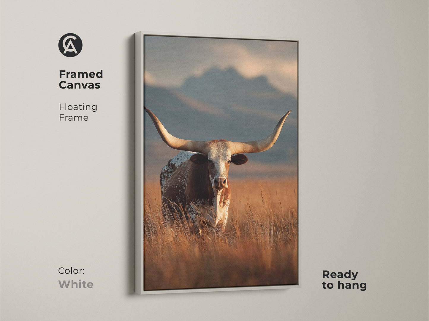 White framed canvas of longhorn cattle. This floating frame is ready to hang. The rustic western landscape uses warm earth tones. This farmhouse wall decor captures the beauty of wildlife. This animal art print is perfect for a cowboy ranch style home.