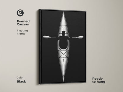 Framed canvas with floating frame showcasing minimalist kayak line artwork in black. Ready to hang this black and white paddler print is ideal for sleek office or home decor.