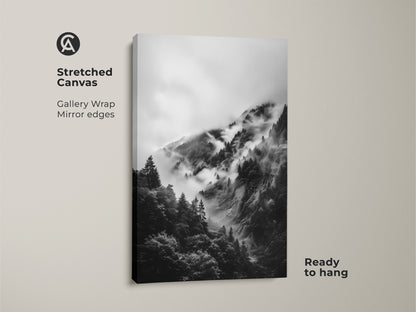 Stretched canvas print showcasing a monochrome mountain scene. The foggy forest art is ready to hang. Gallery wrap with mirror edges provides a modern aesthetic for living spaces.