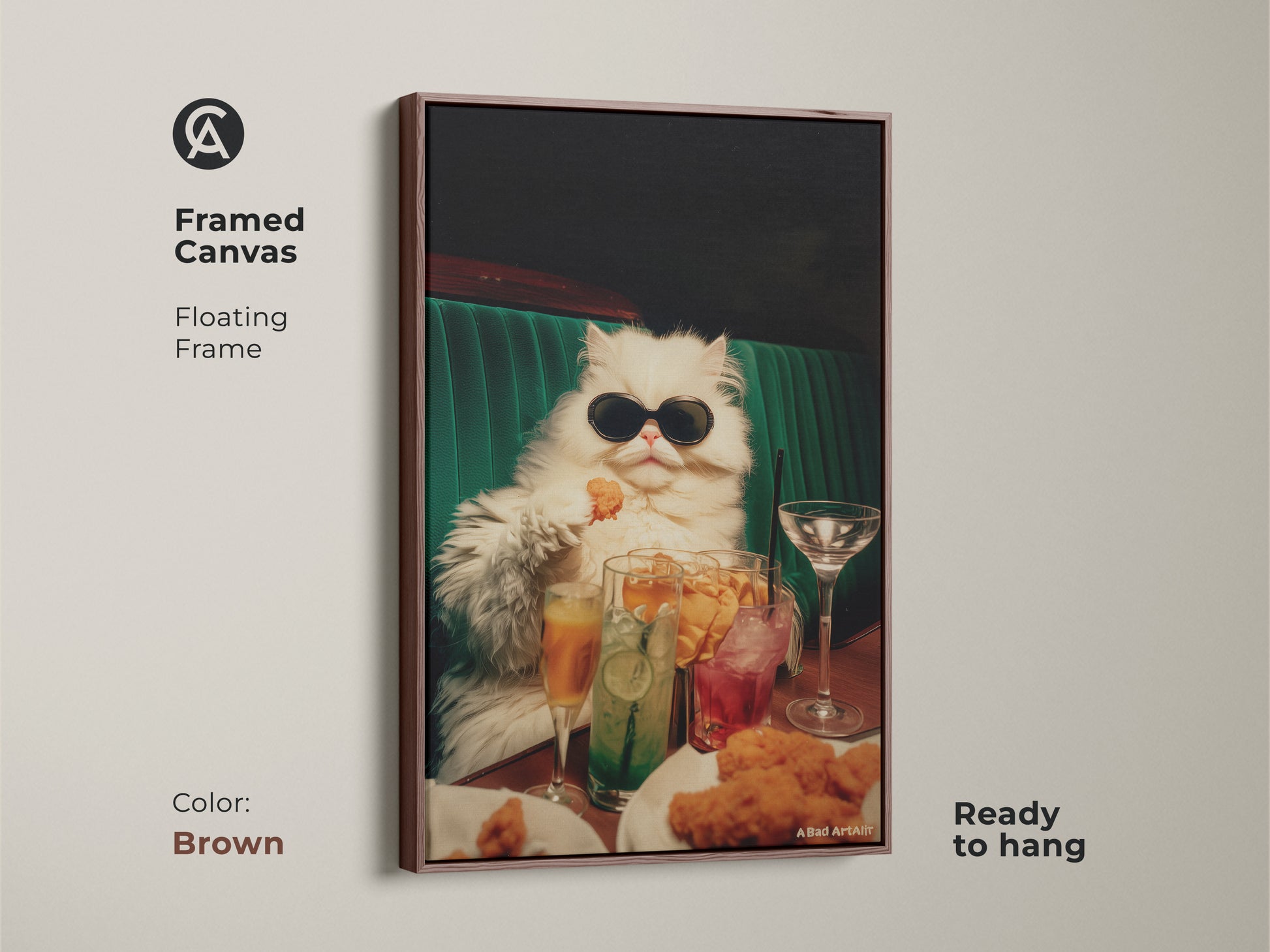 Framed canvas artwork of a persian cat wearing sunglasses. This floating frame is brown. The art shows the cat at a table. Drinks and chicken nuggets are visible. This fun artwork is ready to hang.