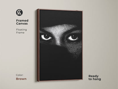 Brown framed canvas featuring monochrome eyes wall art. The abstract face canvas print shows minimalist portrait art. Black and white bedroom decor makes for contemporary living room art. High contrast artwork offers a modern abstract print. This mystery themed art is ready to hang.