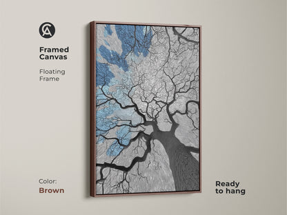 Abstract oak tree artwork with a floating frame in brown. A blue sky canvas print gives a modern nature vibe. This piece is ready to hang making it perfect for easy decor. Ideal as a housewarming gift or an elegant addition to any room. The unique oak tree silhouette enhances your home's aesthetic.