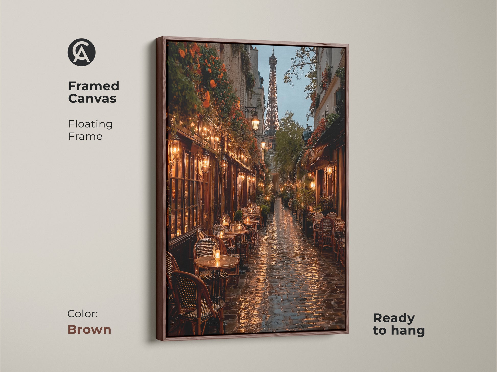 Framed canvas art of a Paris street scene. The floating frame is brown. This artwork captures a rainy evening with the Eiffel Tower. This ready-to-hang canvas adds warmth to any room.